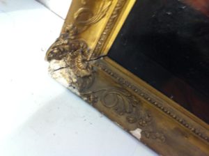 The damage to the picture frames is evident.
