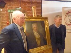NBHT Chairman Harry White and Molson Coors Jonty Fair with the newly restored portrait of William Worthington
